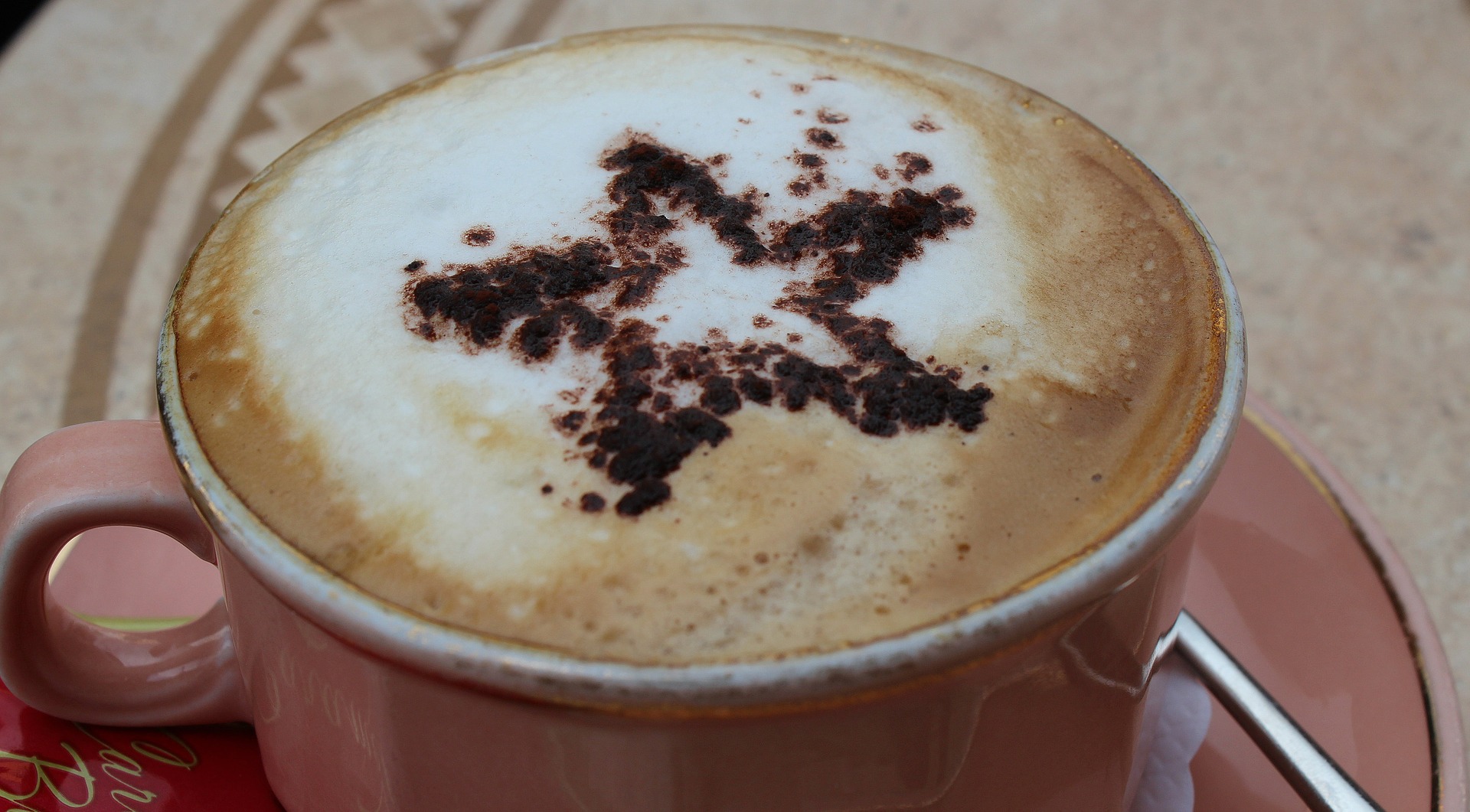 Frothy cappuccino with star on top